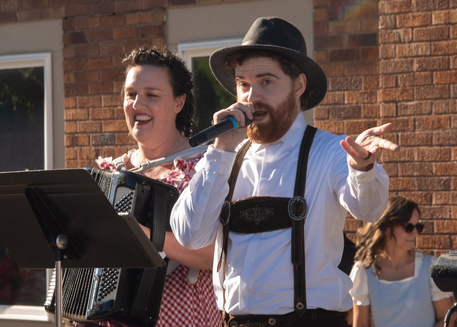 Singer performing with accordion accompaniment