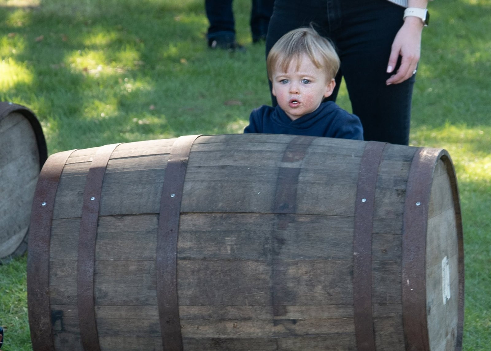 Kids rolling barrels
