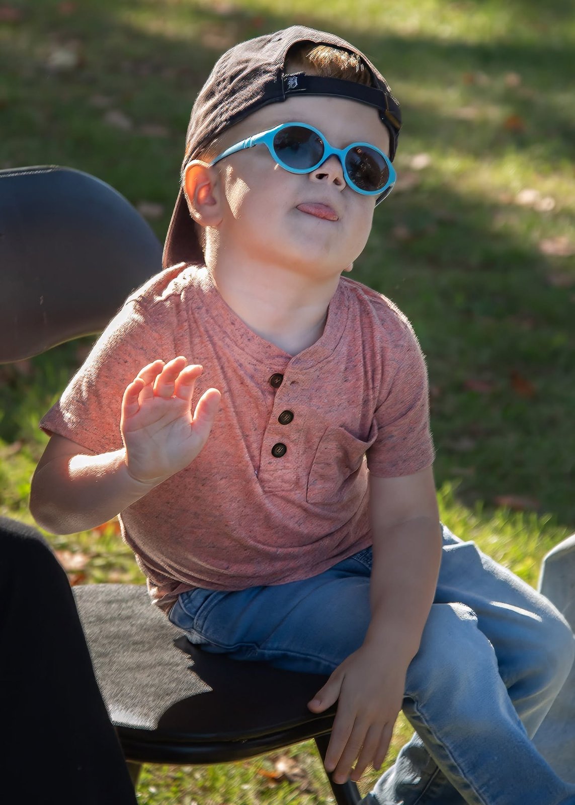 Boy waving